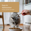 Person sprinkling a powder over cat food with text 'Easy to Administer'.